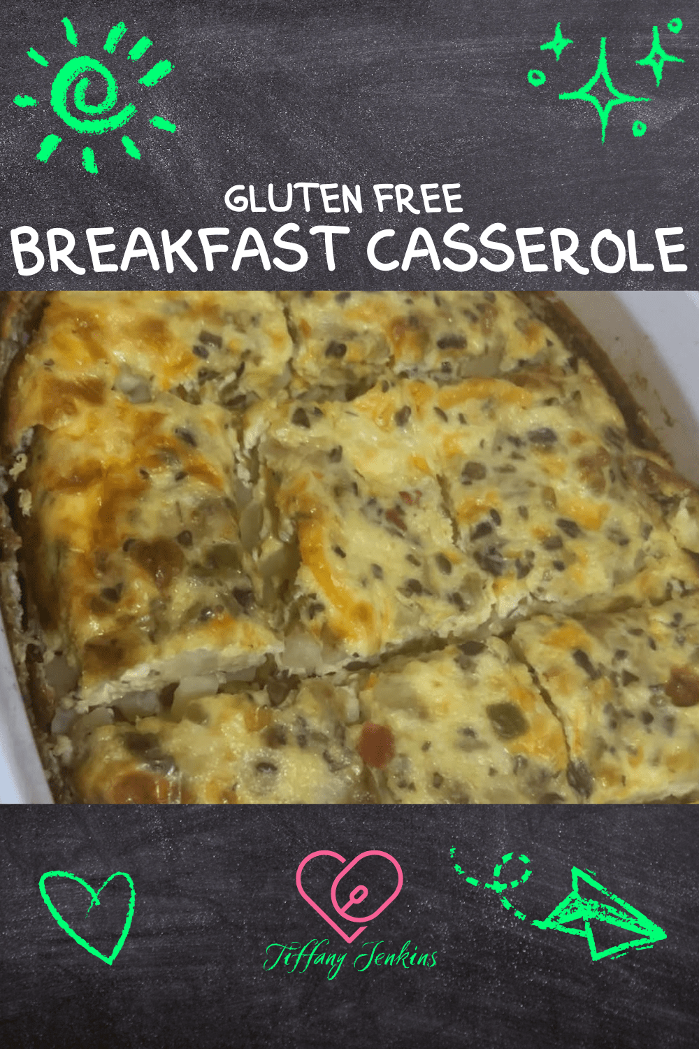 A baked breakfast casserole in a white dish with golden melted cheese and visible potatoes, eggs, and peppers.